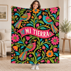 Aves de mi tierra blanket, held open