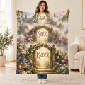 Ask Seek Knock blanket, held open