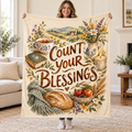 Count Your Blessings blanket, held open