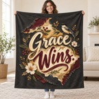 Grace Wins blanket, held open