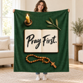 Pray First blanket, held open