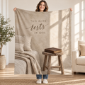 This Home Rests in God. blanket, held open