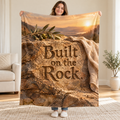 Built on the Rock. blanket, held open