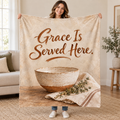 Grace Is Served Here. blanket, held open