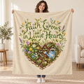 Faith Grows in Little Hearts. blanket, held open