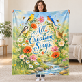 All Creation Sings. blanket, held open