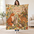 Every Creature Is Loved. blanket, held open