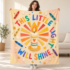 This Little Light Will Shine. blanket, held open